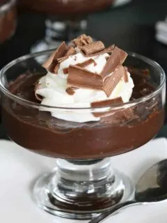 a glass dish filled with dark chocolate pudding