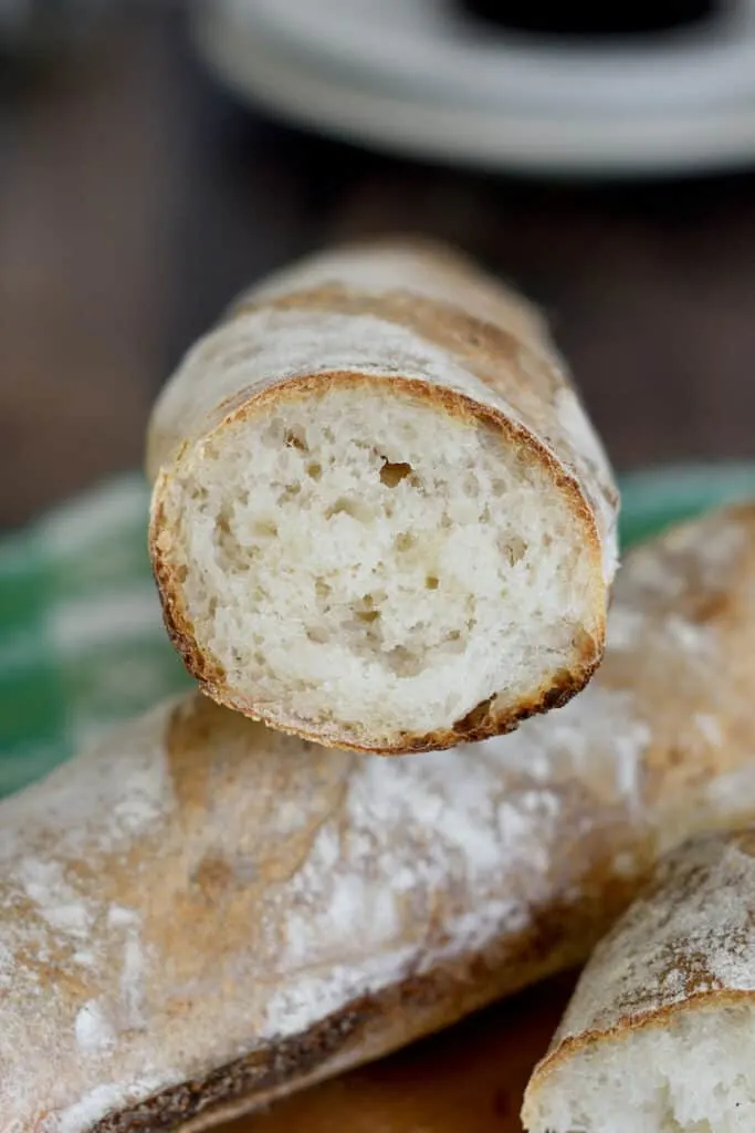 a closeup shot of the crumb on a sourdough baguette