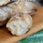a pinterest image for sourdough baguettes with text overlay