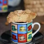 a sourdough biscotti on a cup of expresso
