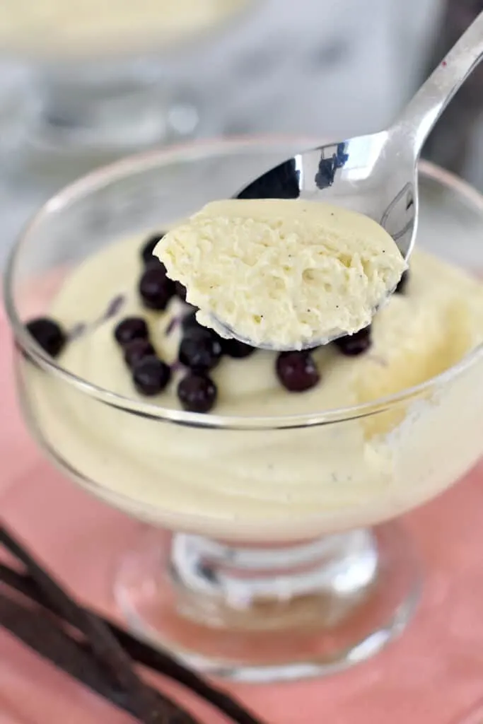 a closeup of a spoonful of vanilla mousse