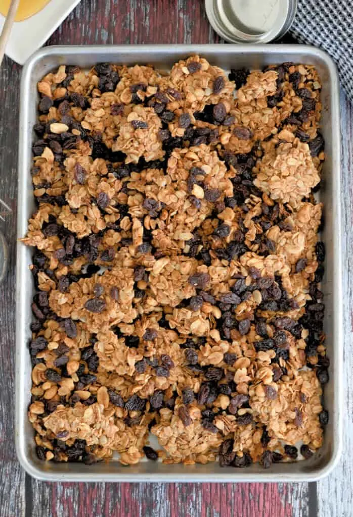 a tray of peanut butter granola with raisins