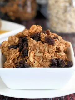 a bowl of peanut butter granola with raisins