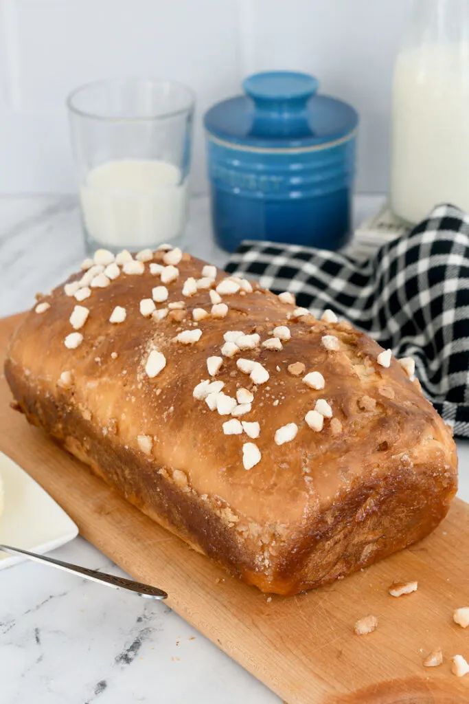 a loaf of sourdough suikerbrood on a cutting board