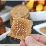 a pinterest image for whole wheat sourdough crackers with text overlay
