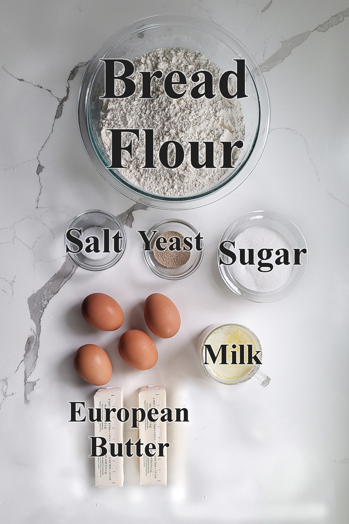 ingredients for brioche in glass bowls. 