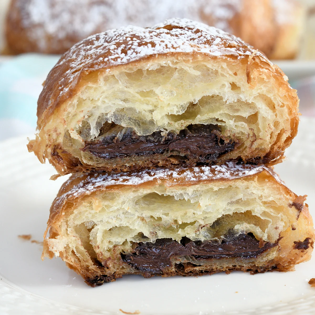 a chocolate croissant on a plate
