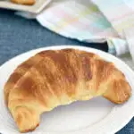 a croissant on a plate