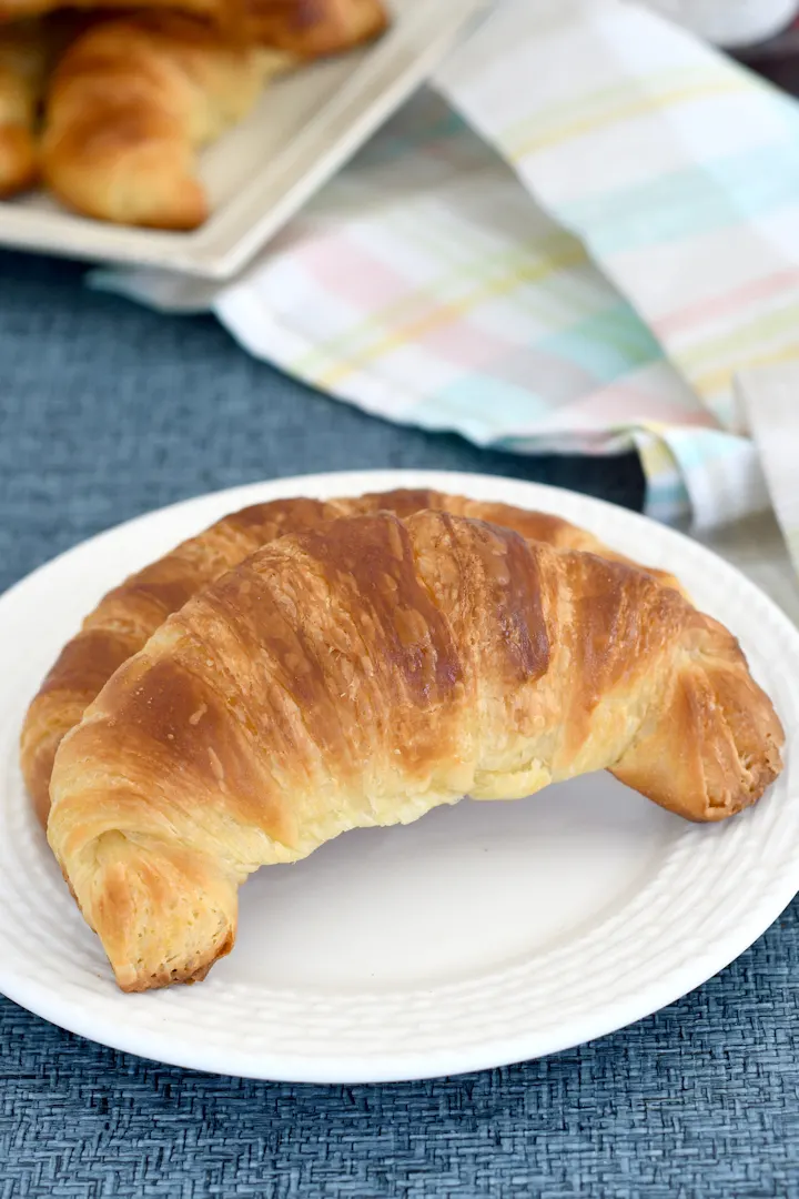 a croissant on a plate