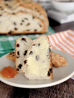 a slice of irish soda bread with butter and marmalade