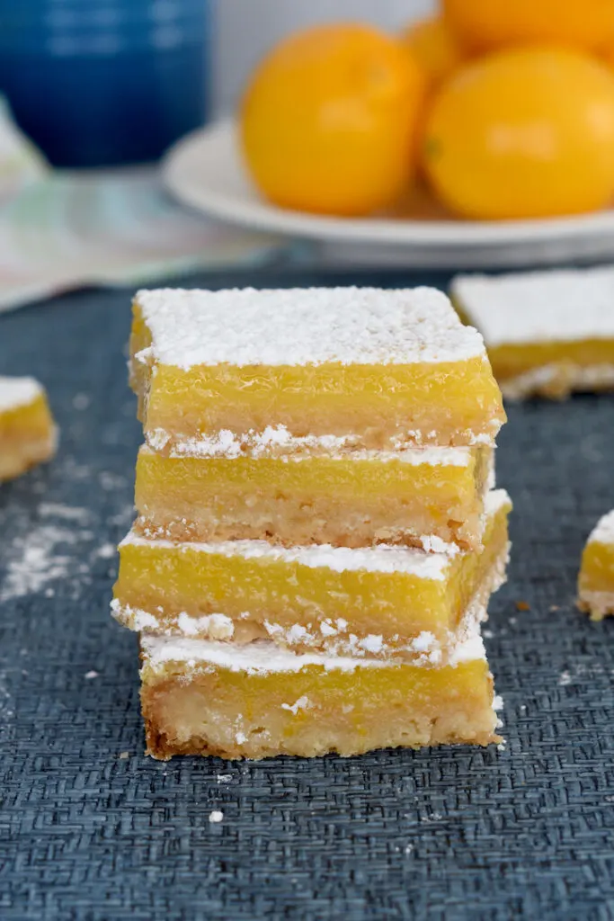 a stack of meyer lemon bars