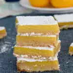 a pinterest image for meyer lemon bars with text overlay