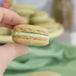 a pinterest image for pistachio macarons with text overlay