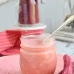 a pinterest image for rhubarb curd with text overlay
