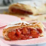 a pinterest image for cherry strudel with text overlay