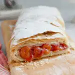 a pinterest image for cherry strudel with text overlay