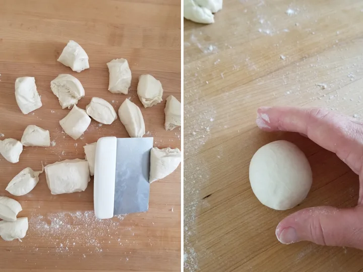 pieces of dough on a work surface and a hand shaping a dough ball