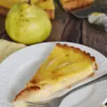 A pinterest image for pear custard tart with text overlay