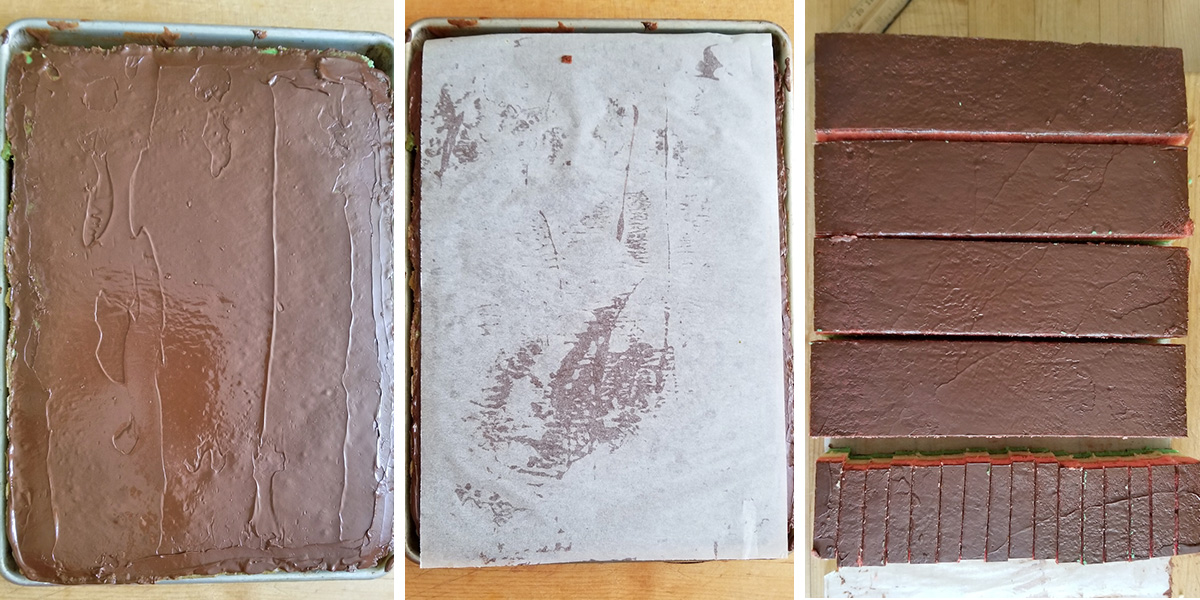 a slab of rainbow cookies iced with chocolate then being cut into strips.