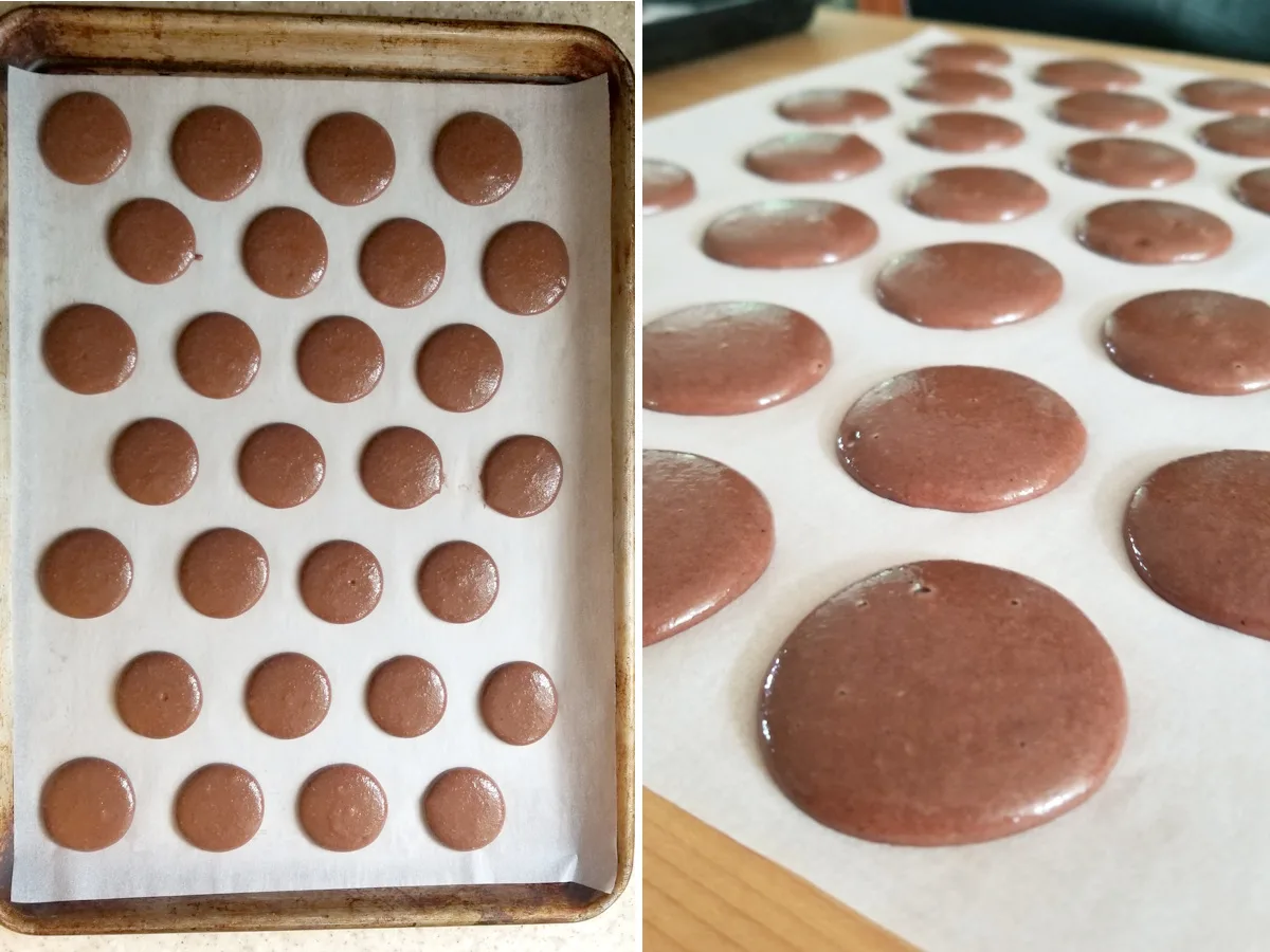 a tray of unbaked chocolate macaron shells