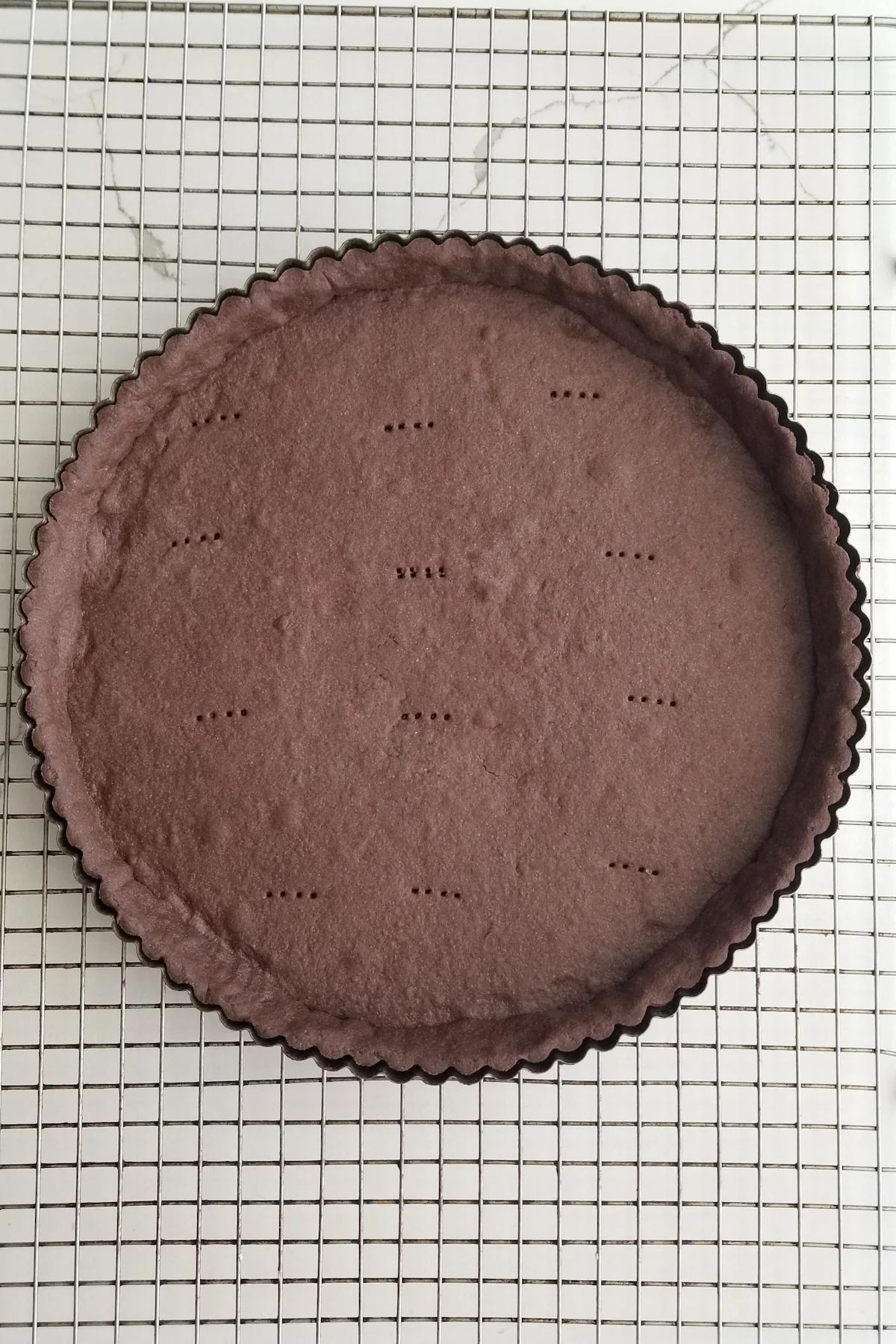 a baked chocolate tart crust.