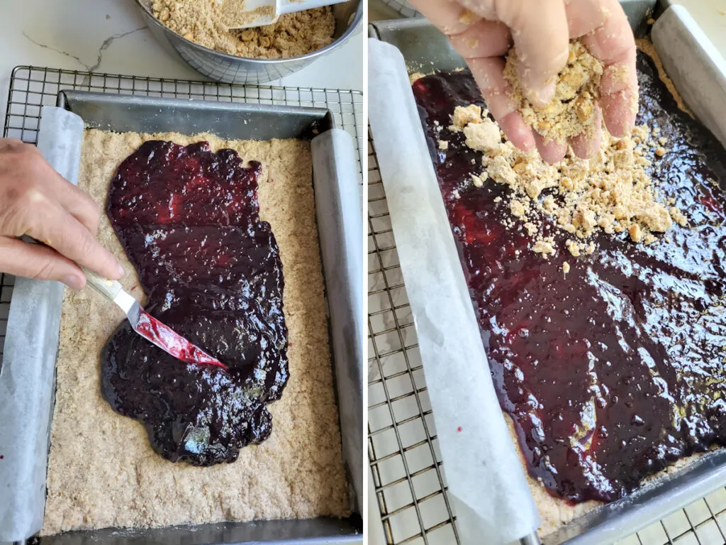 spreading jelly over a cookie and sprinkling crumbs on the jelly