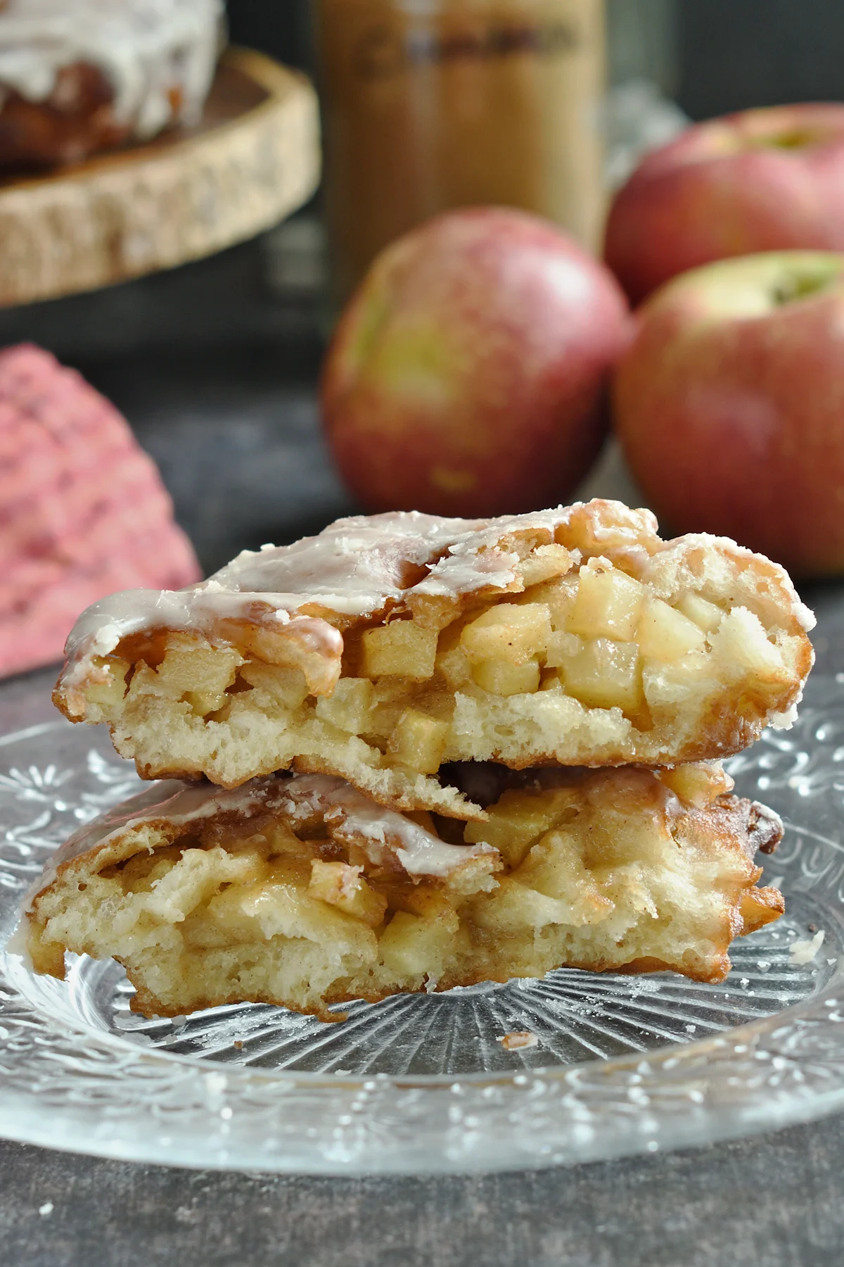 cut apple fritter on a plate.