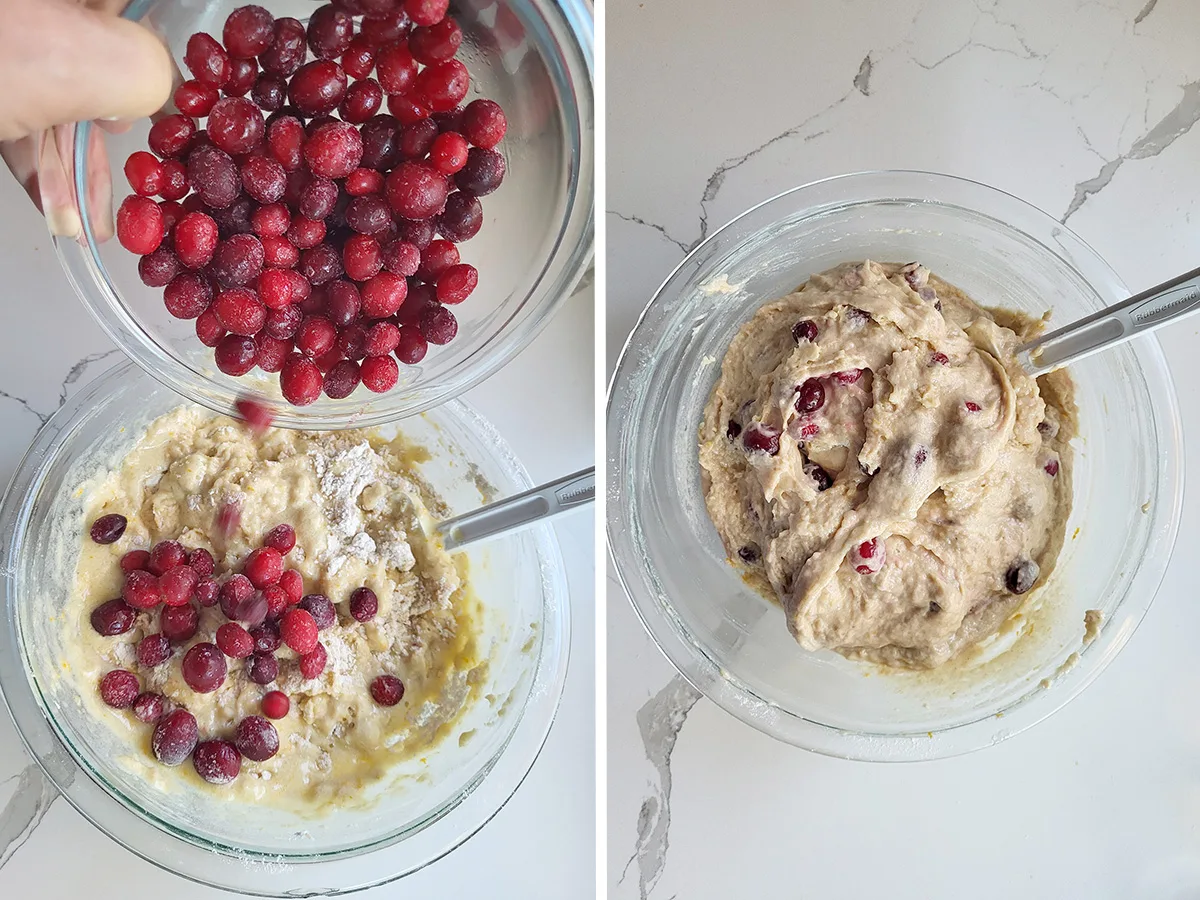 A bowl of cranberries pouring in to a bowl of batter. A bowl of cranberry muffin batter.