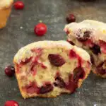 A pinterest image for cranberry muffins with text overlay.