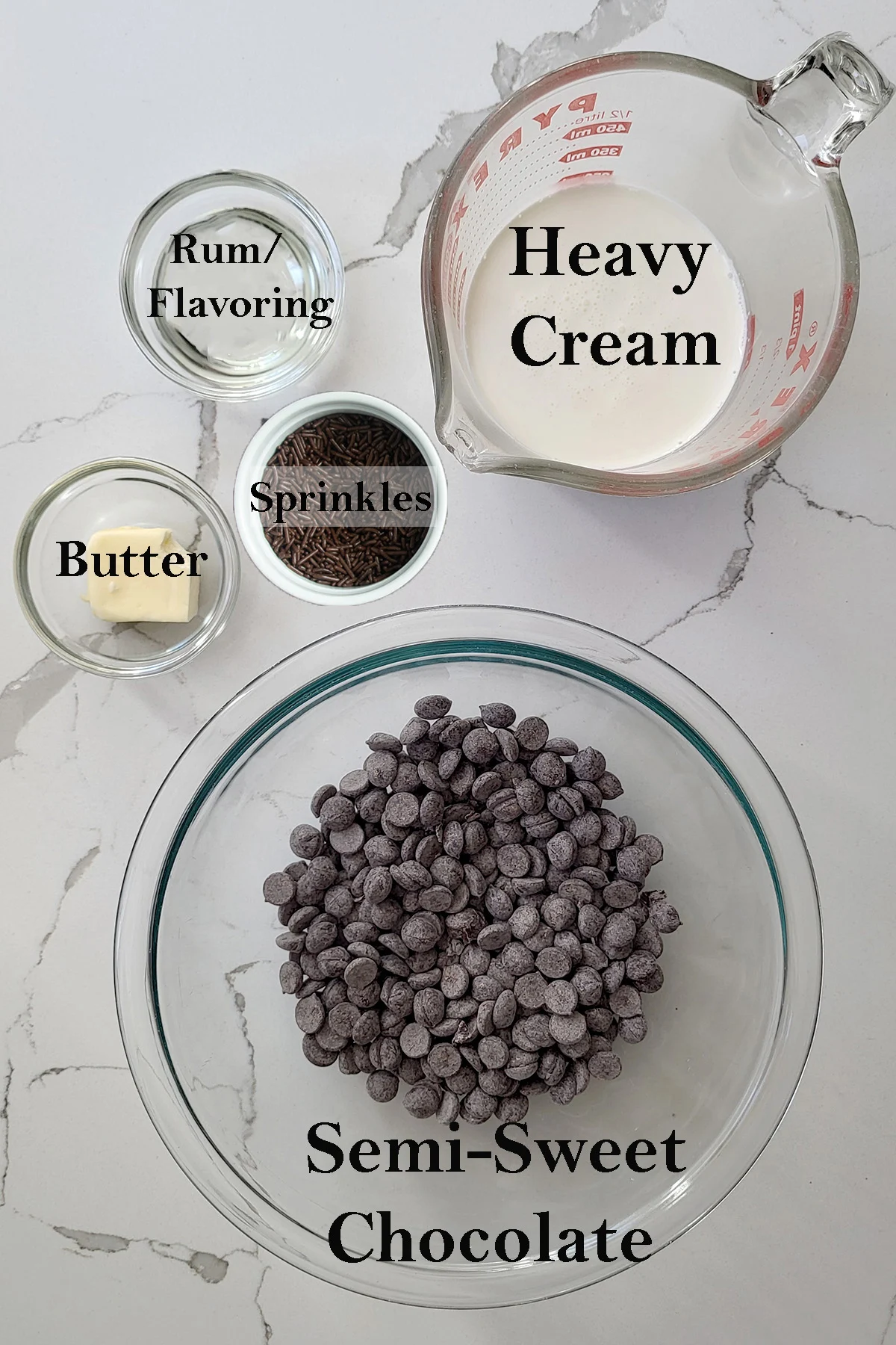 ingredients for making chocolate truffles in bowls