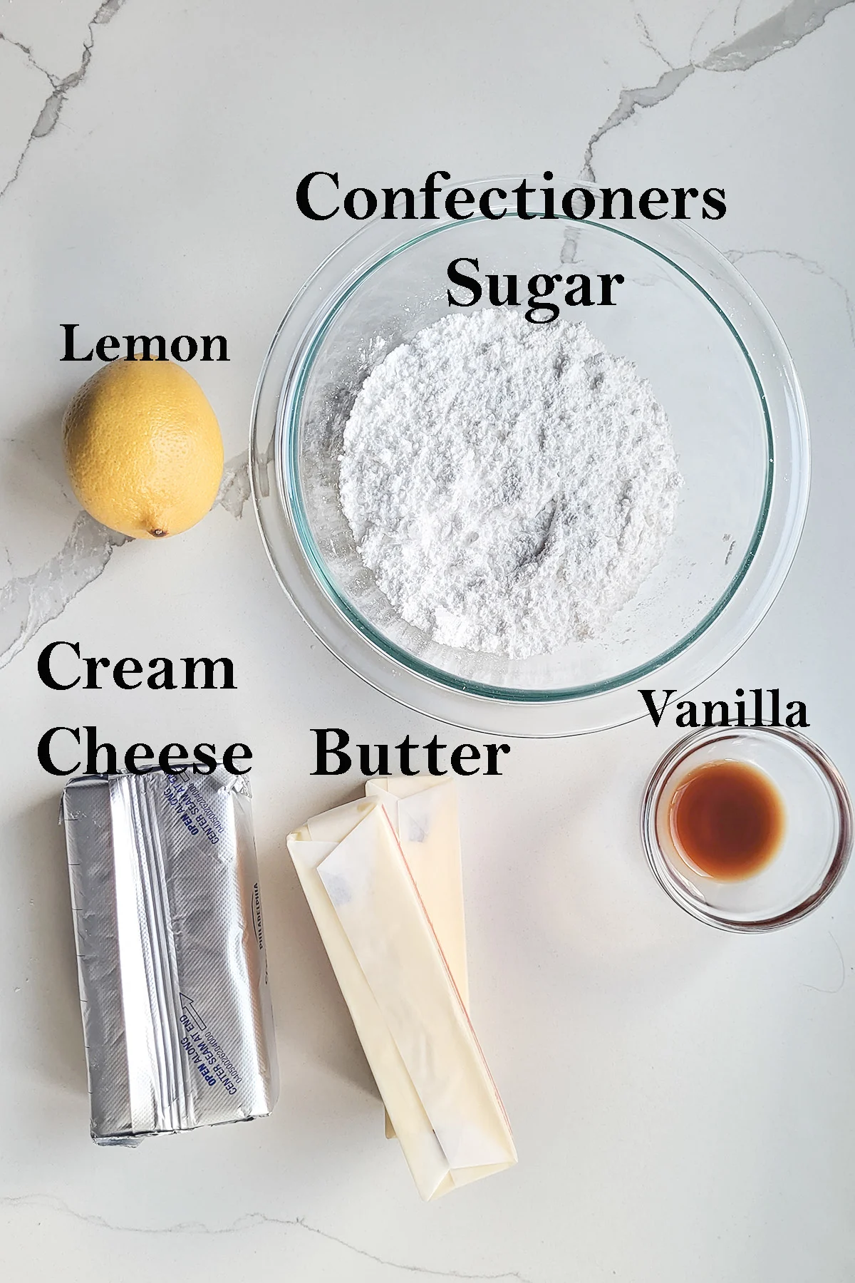 ingredients for cream cheese frosting displayed in bowls with text overlay