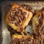 a pinterest image for sticky buns with text overlay.