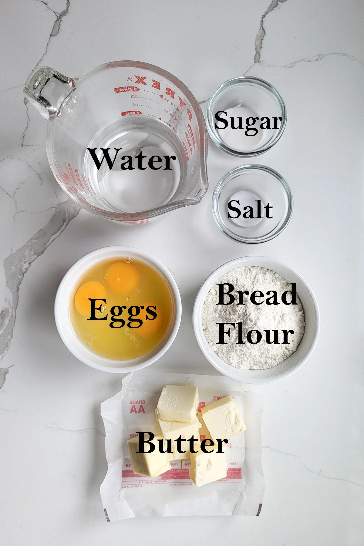 ingredients for making pate a choux in bowls.