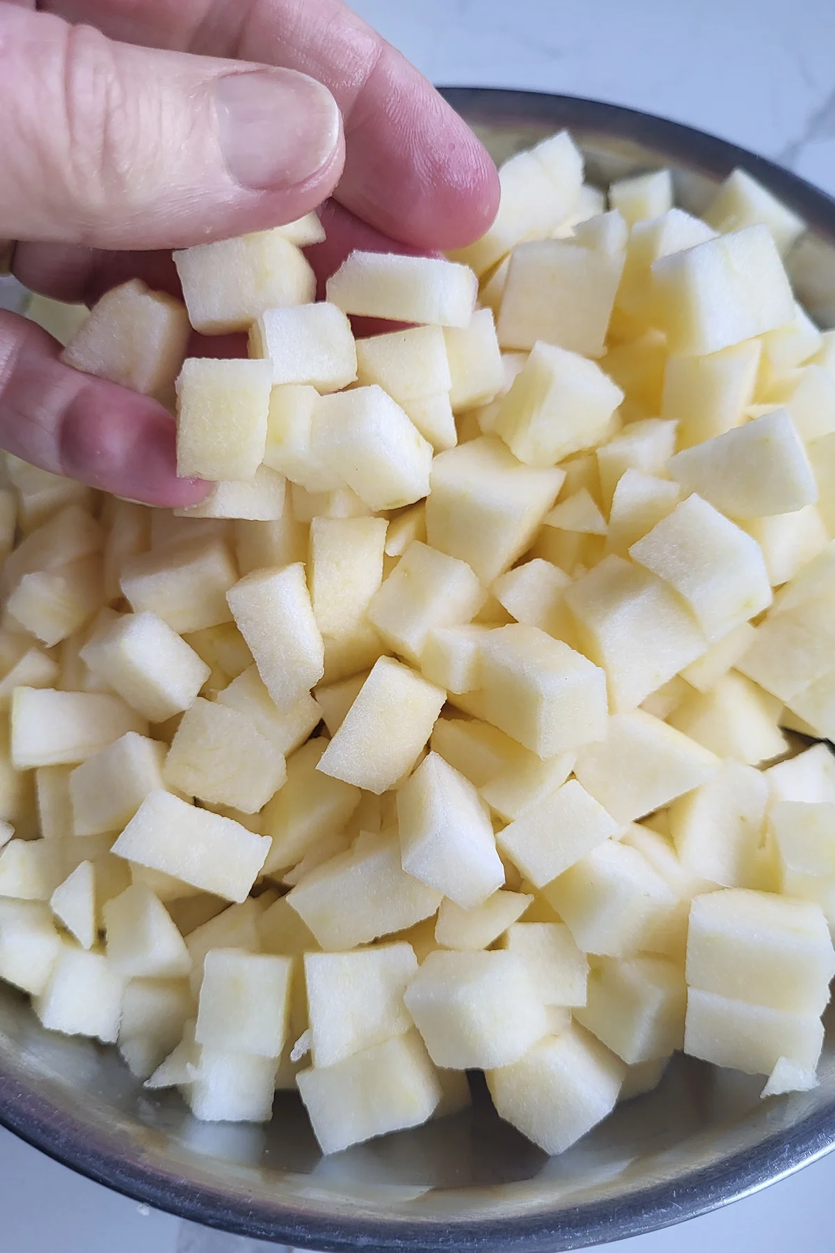 a bowl of chopped apples.