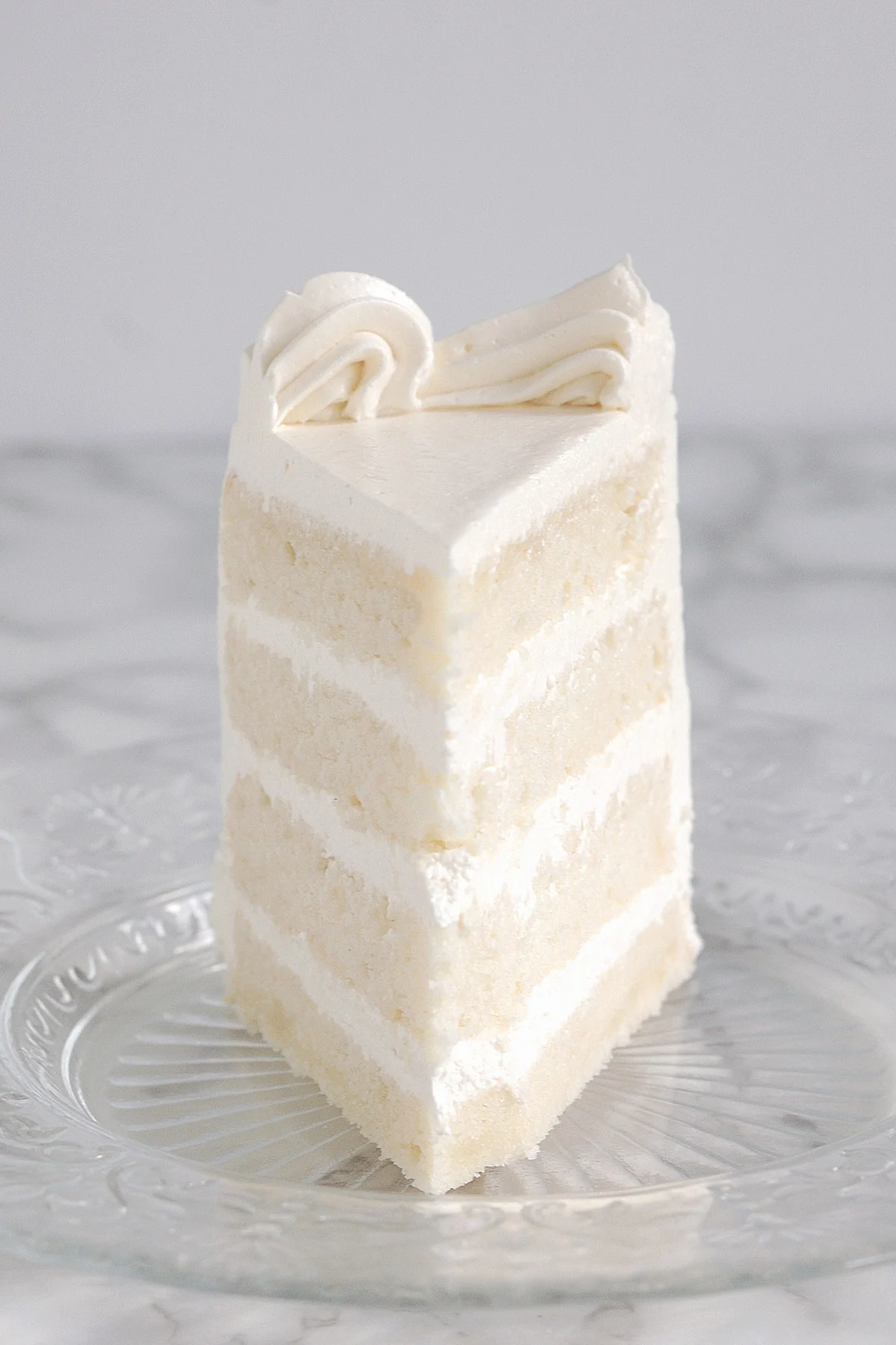 beauty shot of a slice of white cake