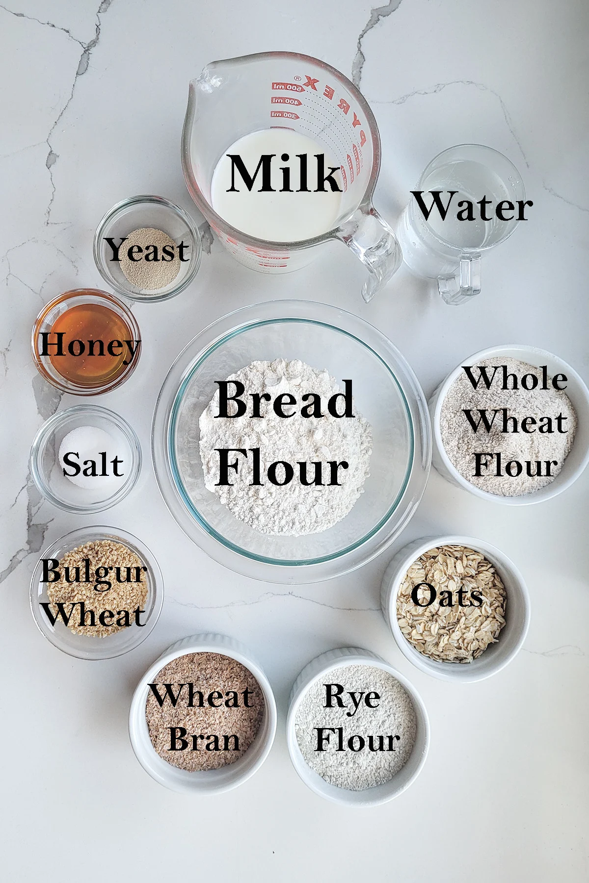 ingredients for multigrain bread in bowls with text overlay.