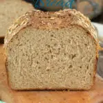 A pinterest image for multigrain bread with text overlay.