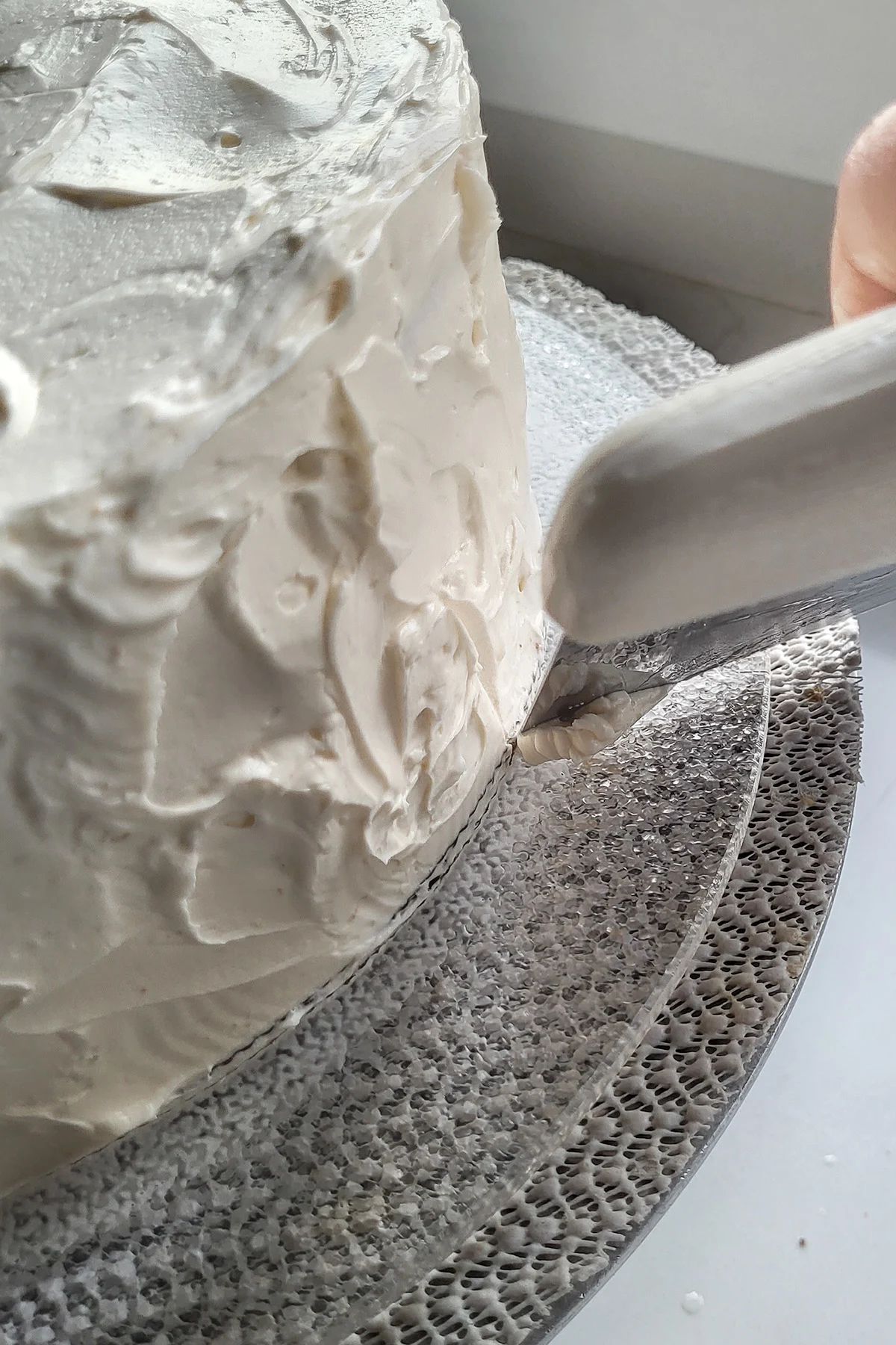 closeup of cake on a turntable.