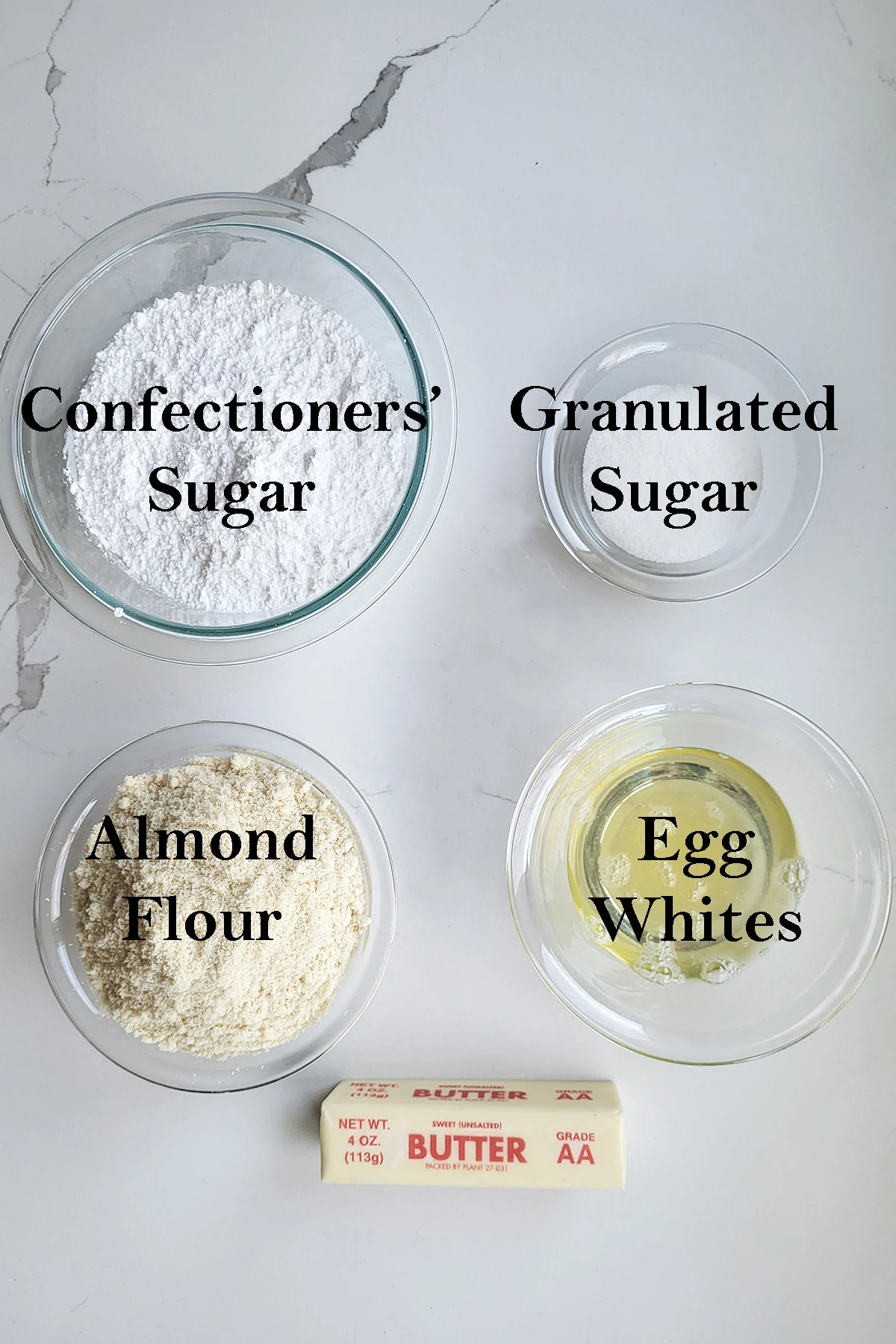 ingredients for strawberry macarons in bowls