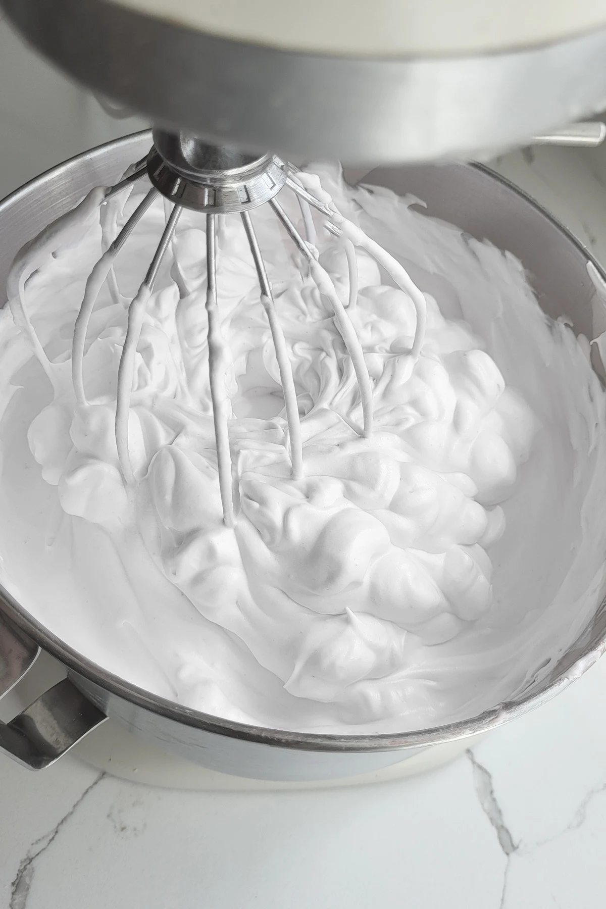 a bowl of whipped egg whites.