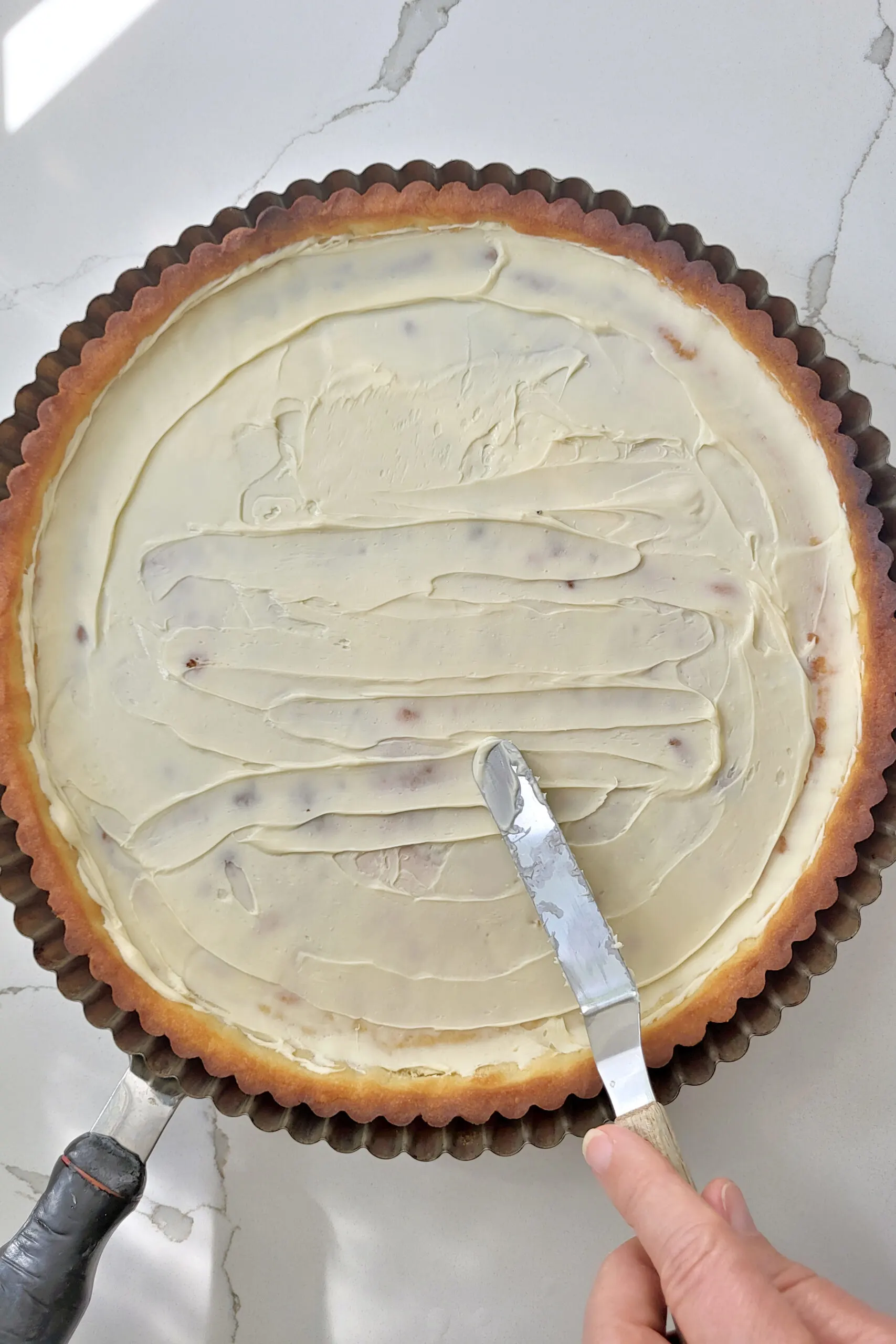 a baked tart shell coated with white chocolate.