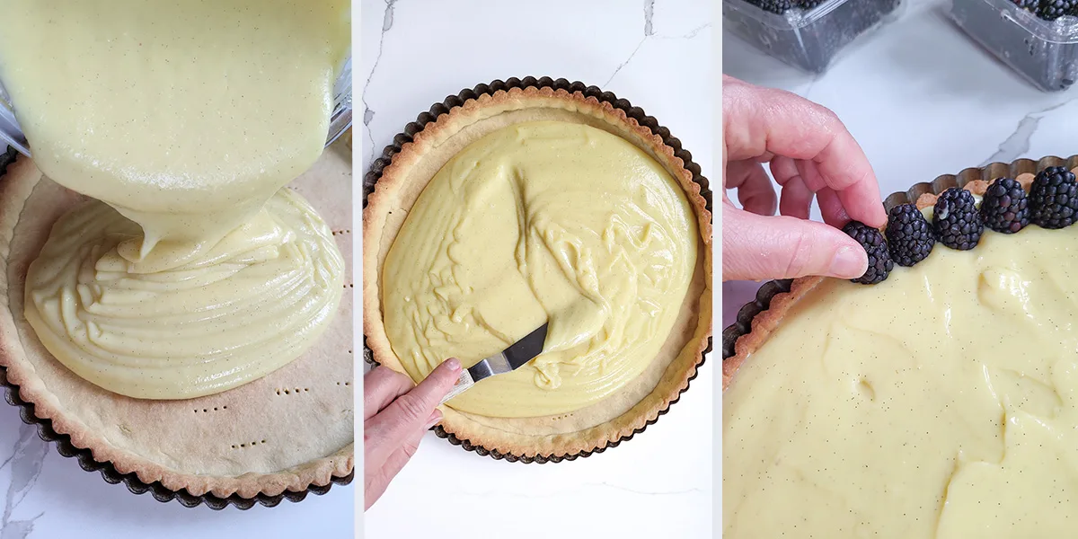 Pouring pastry cream into a baked tart shell and adding blackberries.