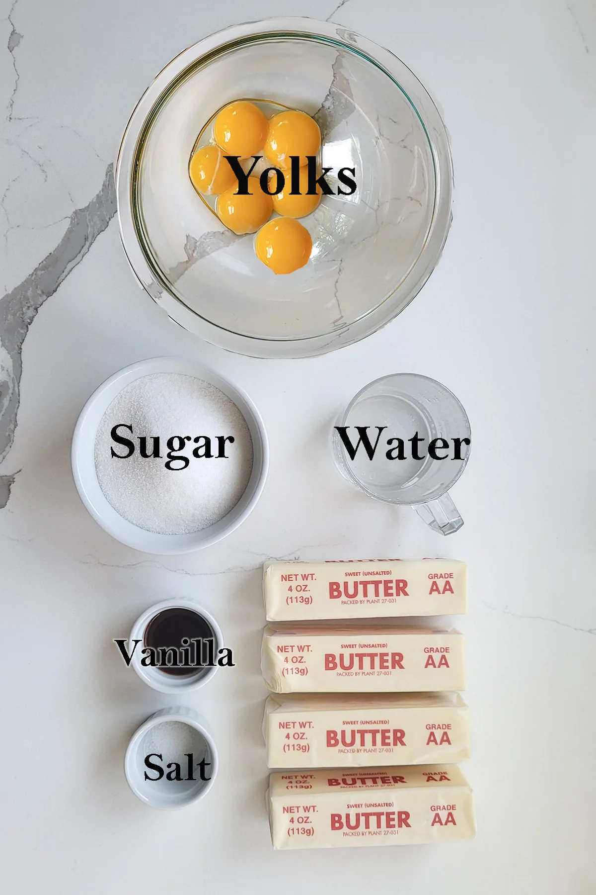 ingredients for french buttercream in bowls.