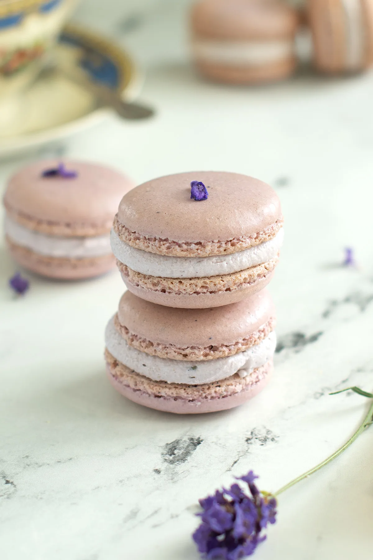 a stack of lavender macarons.
