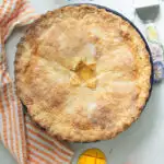 a pinterest image for peach mango pie with text overlay.