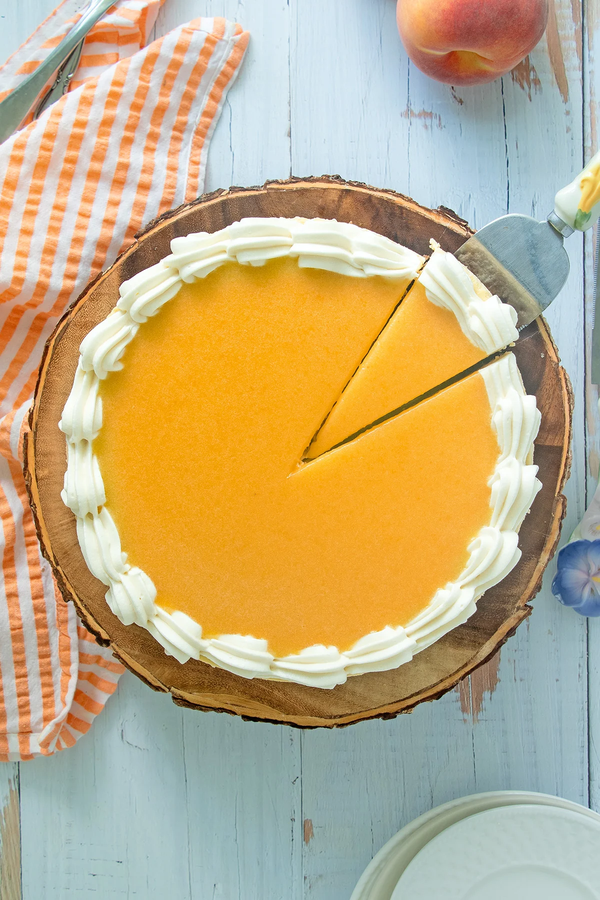 a overhead shot of a peach cheesecake.