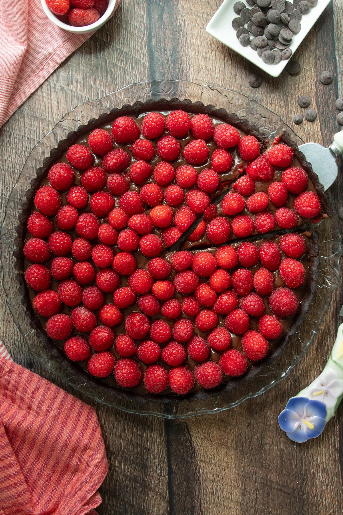 a chocolate raspberry tart seen from overhead