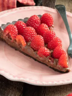 a slice of chocolate raspberry tart.