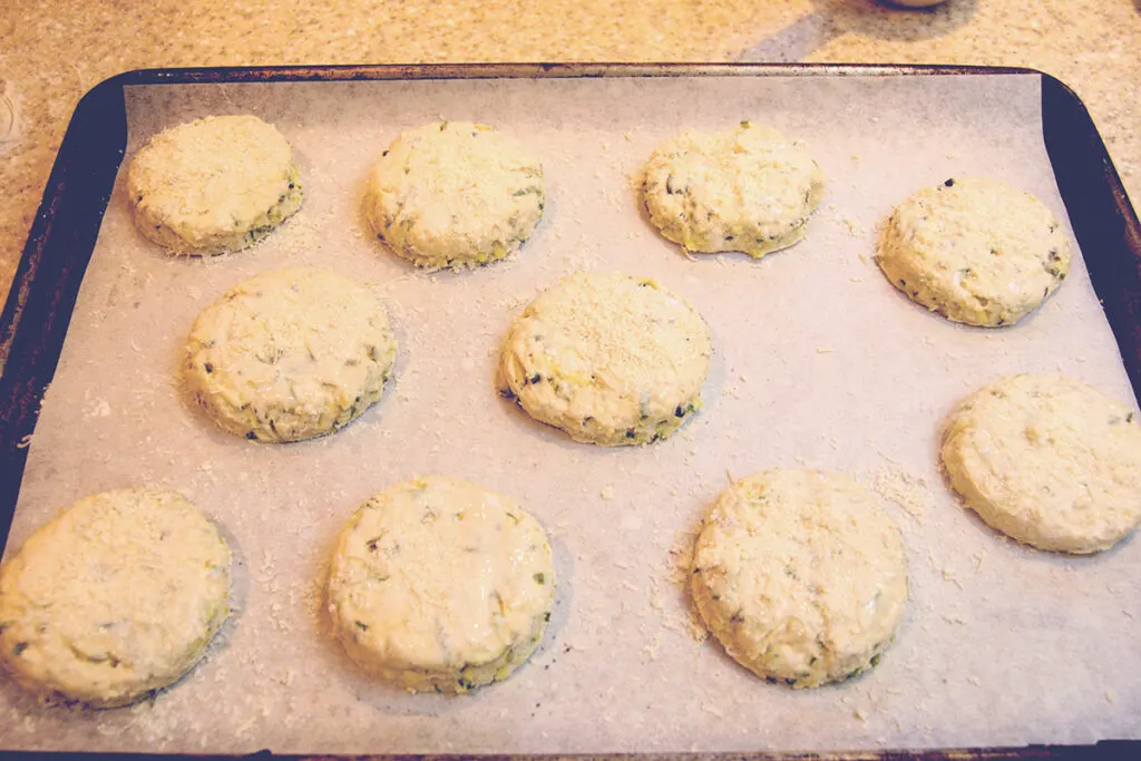 raw biscuits on a tray.