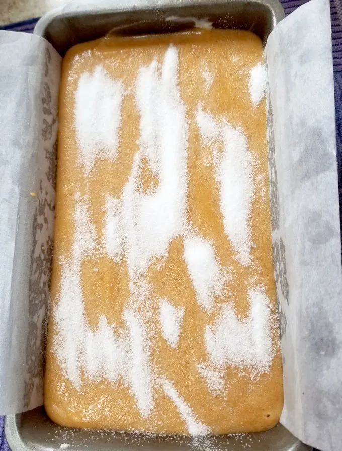 pumpkin bread batter in a loaf pan.